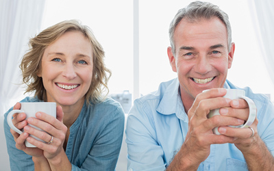 Couple with Coffee Mugs